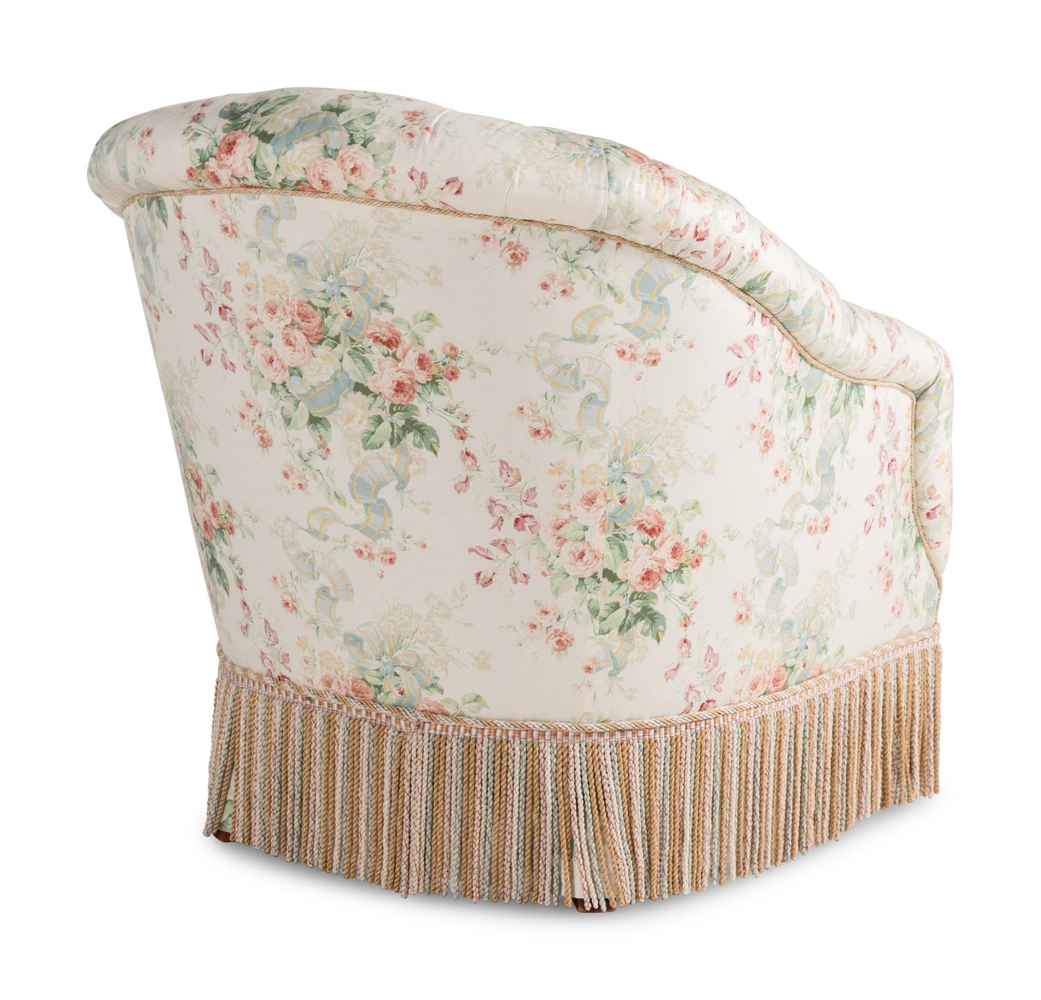 A Floral Chintz-Upholstered Lounge Chair and Ottoman