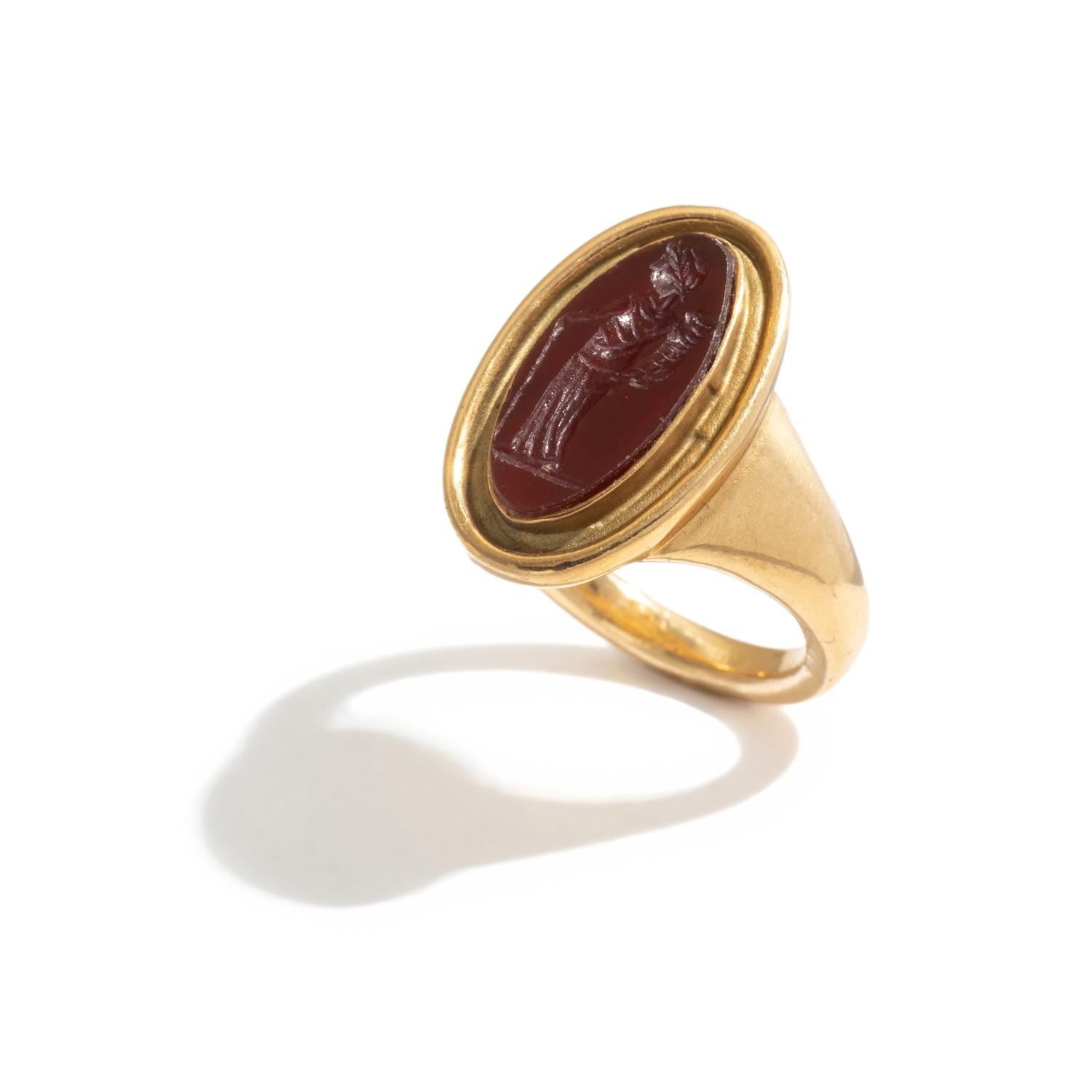 A Roman Carnelian Ring Stone with the Goddess Ceres — Set in a gold ring