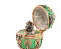 A Gold, Guilloché Enamel and Gemstone-Mounted Surprise Egg