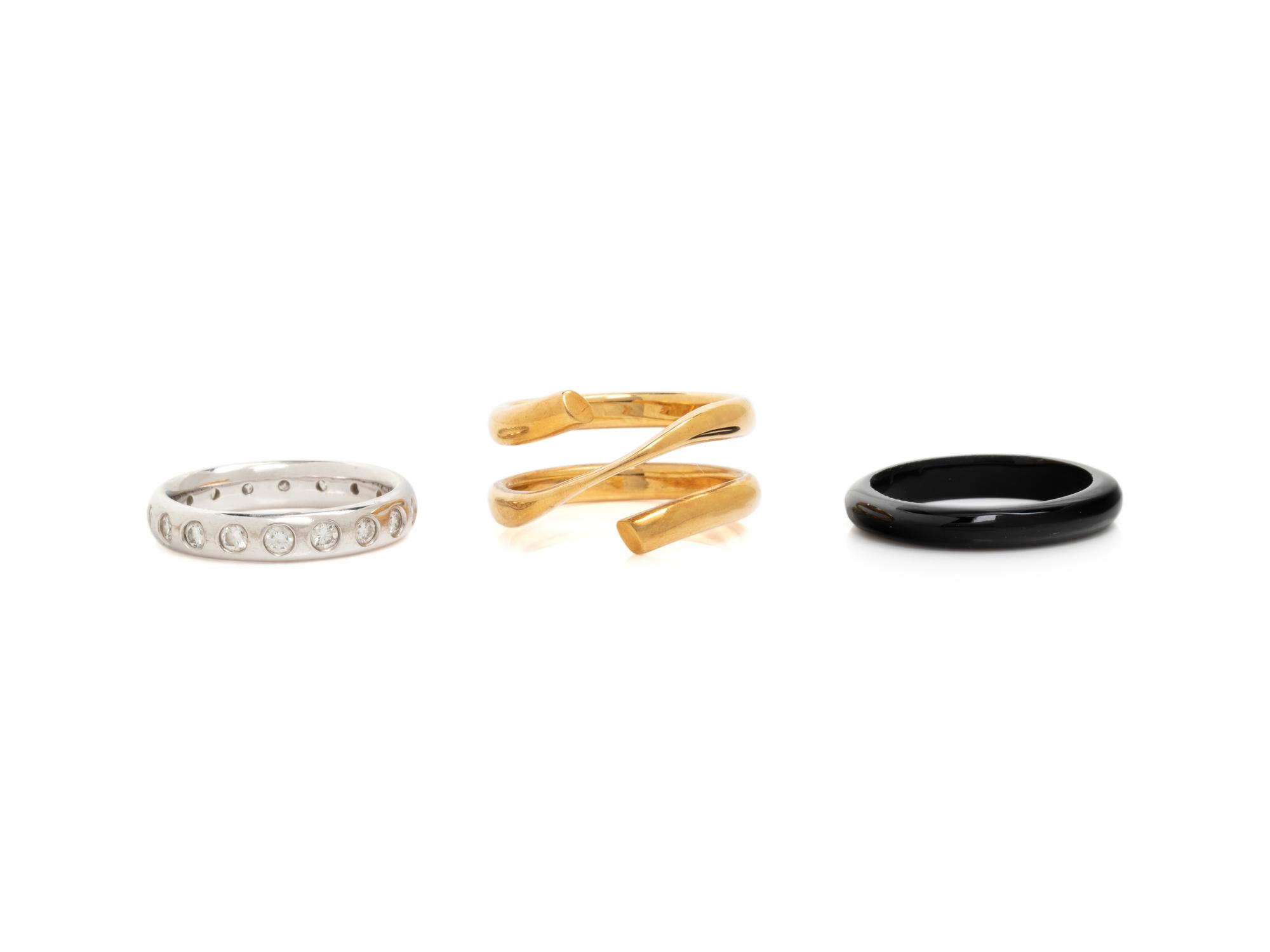 CONVERTIBLE BICOLOR GOLD, DIAMOND AND ONYX RING