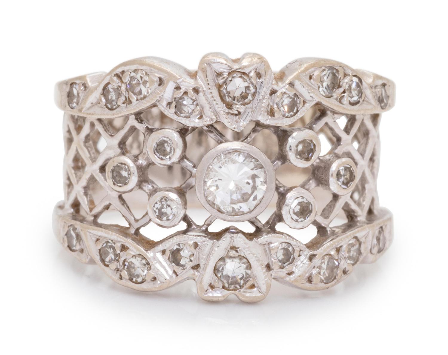 A 14 Karat White Gold and Diamond Ring,