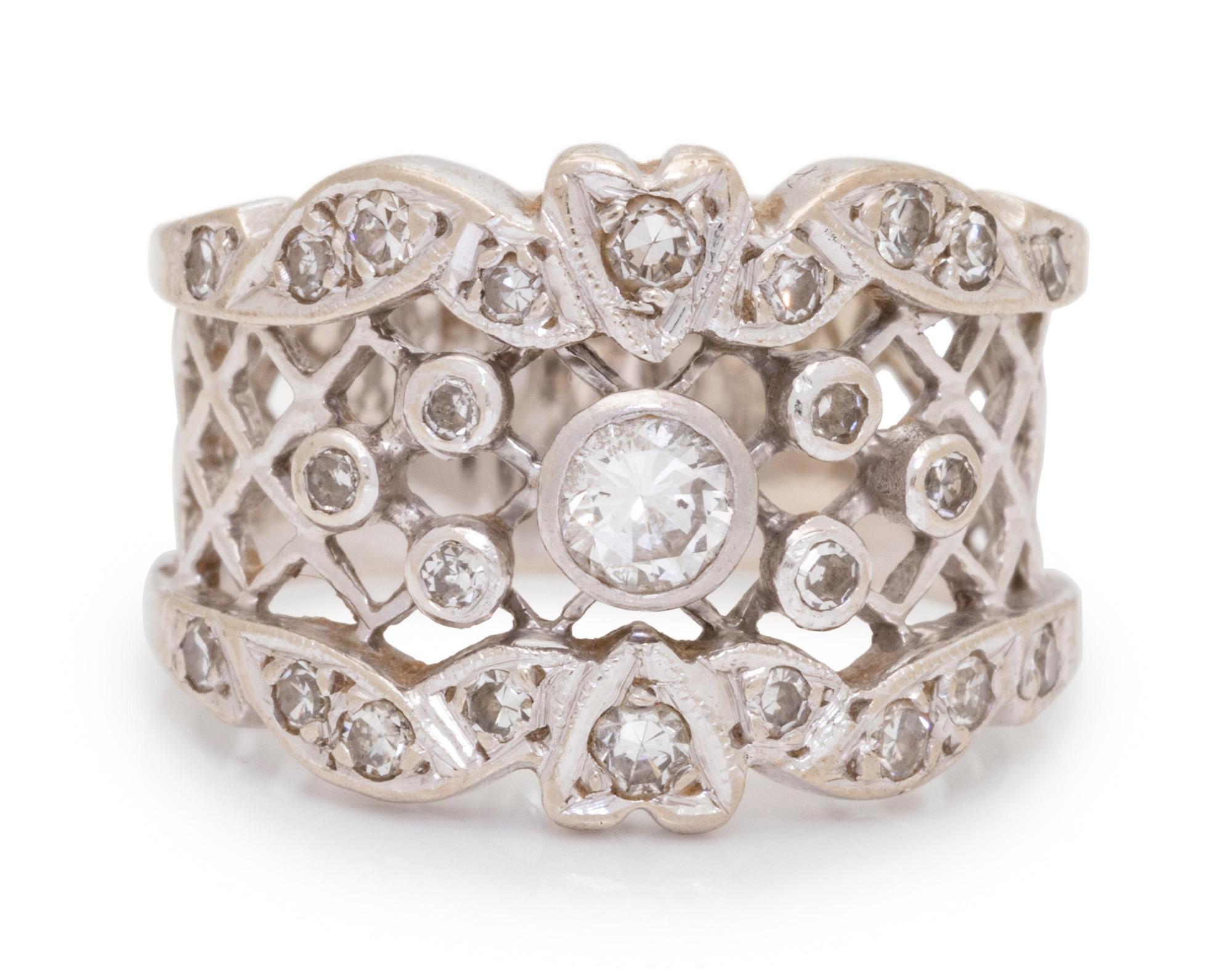 A 14 Karat White Gold and Diamond Ring,