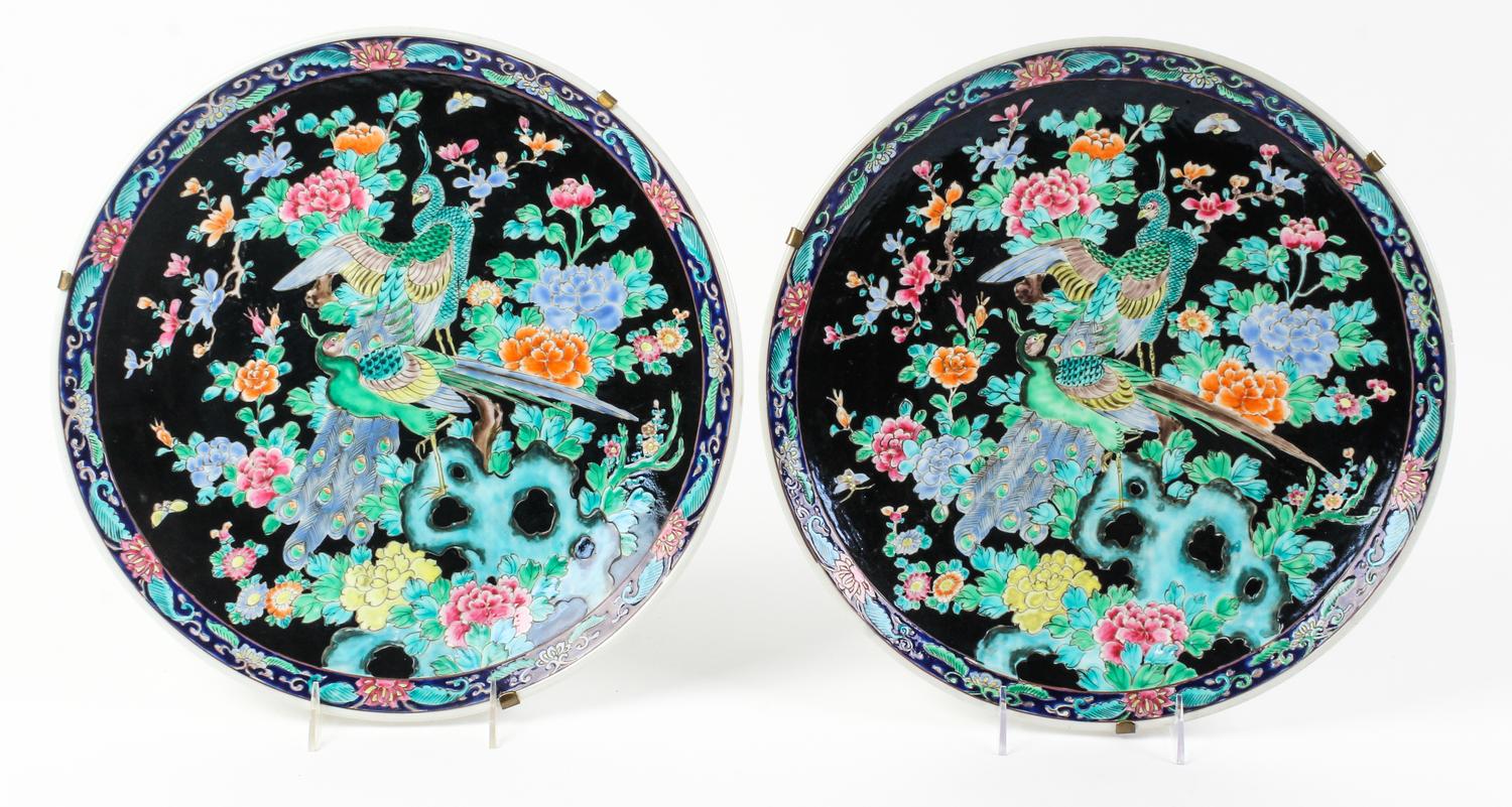 A Pair of Famille Noir Porcelain Chargers Diameter 14 1/2 inches. — 20TH CENTURY