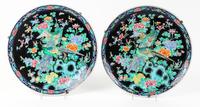 A Pair of Famille Noir Porcelain Chargers Diameter 14 1/2 inches. — 20TH CENTURY