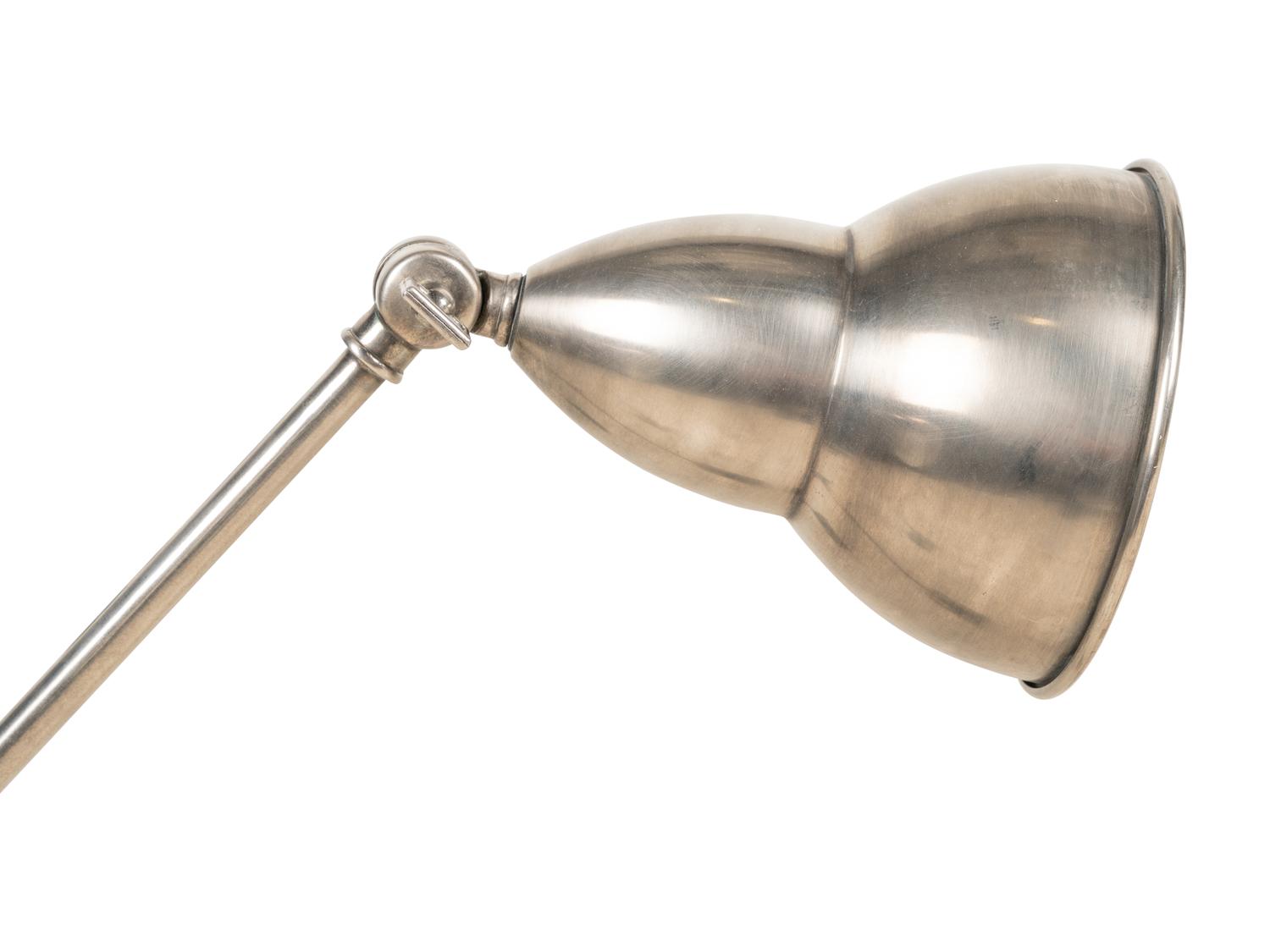 A Set of Six Swing-Arm Wall Lights