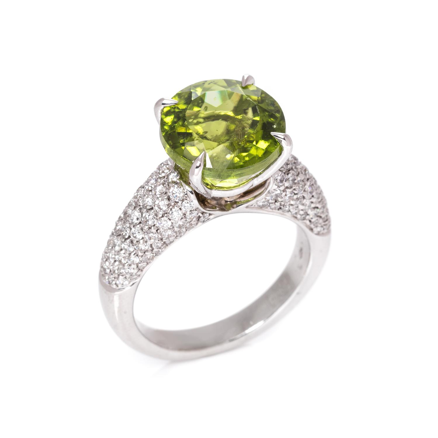 An 18 Karat White Gold, Peridot and Diamond Ring,