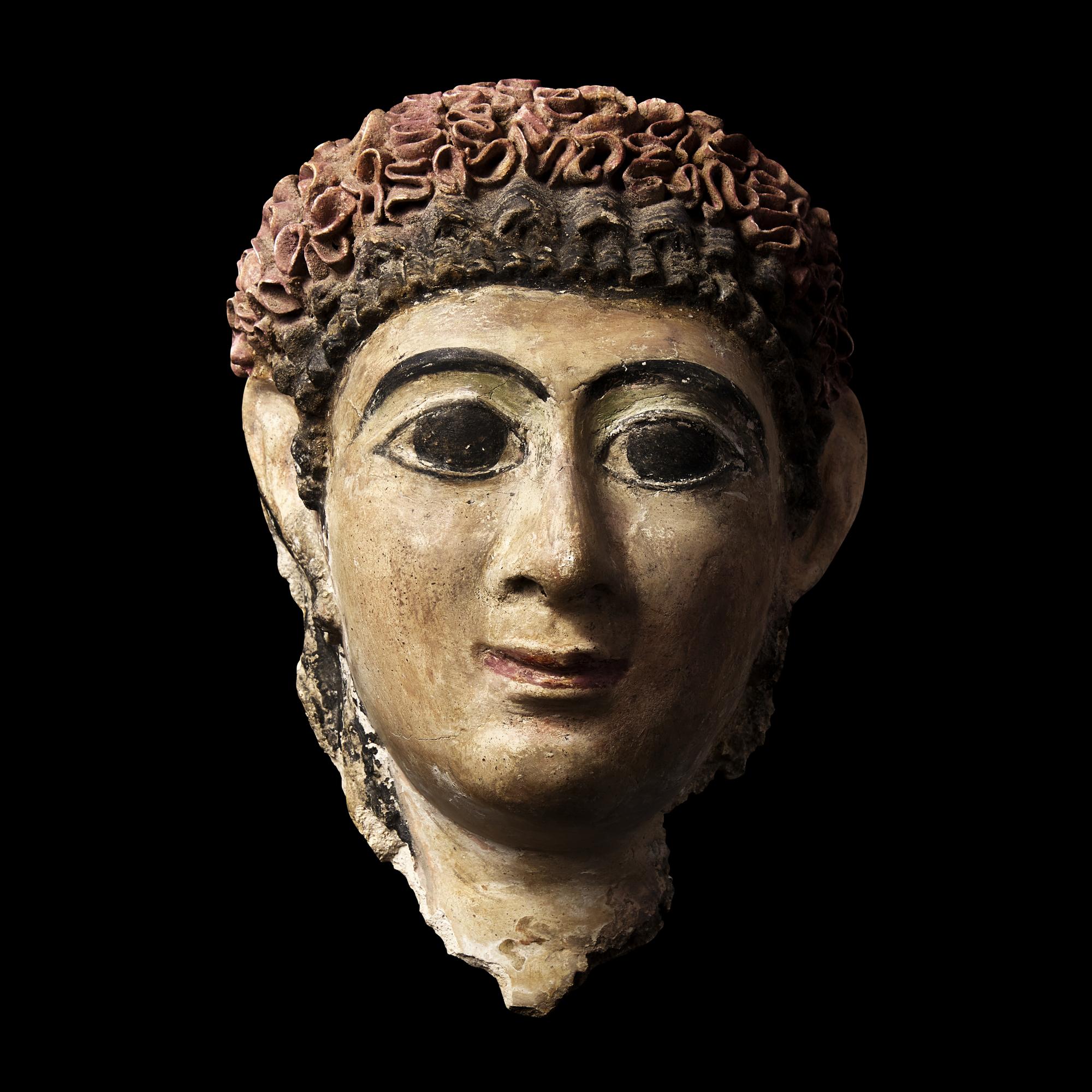 An Egyptian Cartonnage Mummy Mask