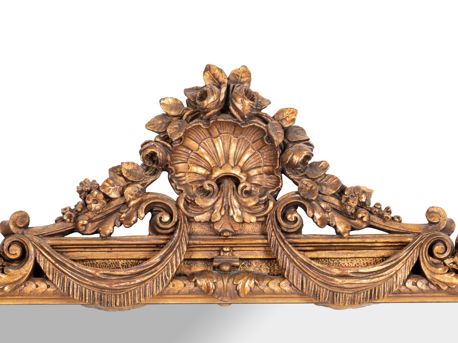 A Neoclassical Carved Giltwood Mirror