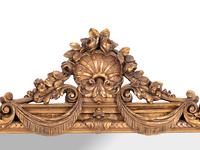 A Neoclassical Carved Giltwood Mirror