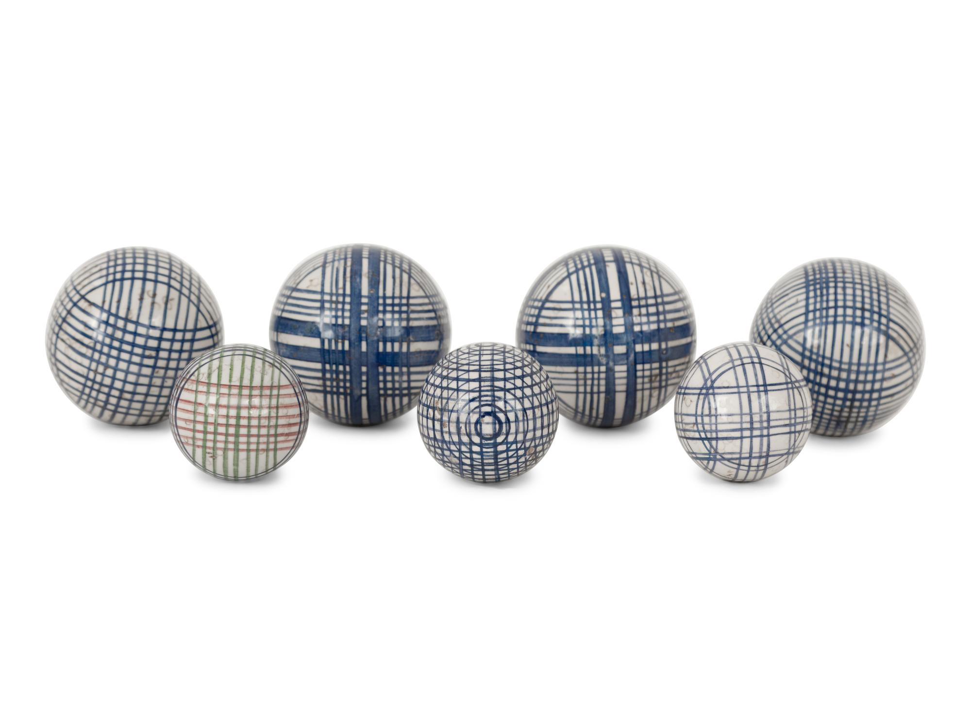 A Group of Seven Victorian Blue and White Ceramic Carpet Balls