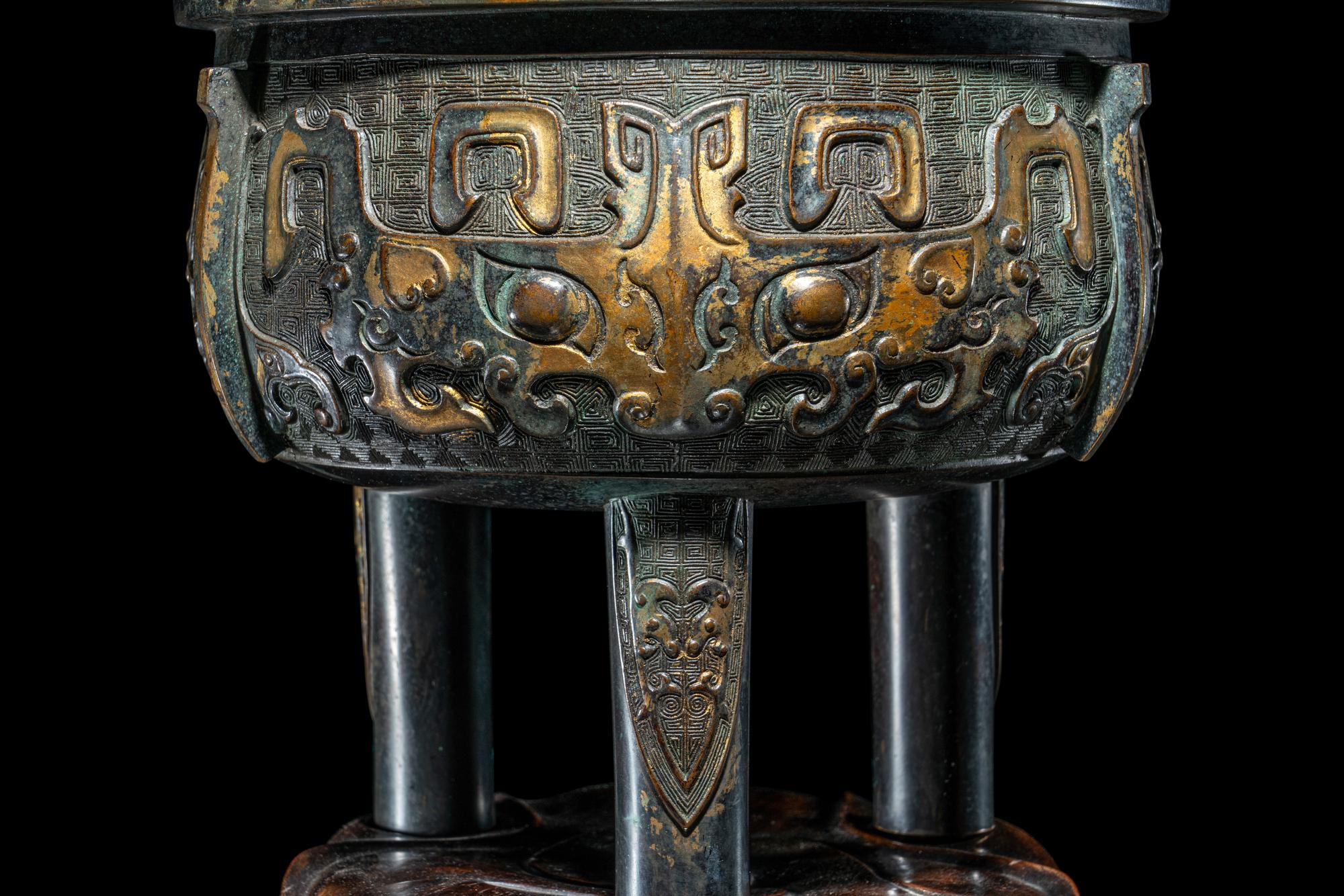 A Chinese Parcel Gilt Archaistic Bronze Bronze Ding Vessel