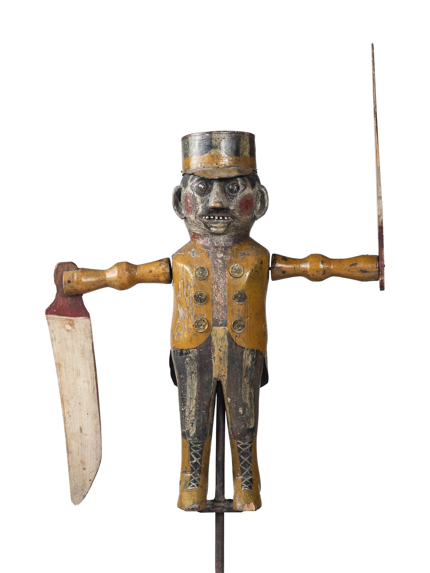 A Carved and Painted Wood and Sheet-Tin Circus Ringmaster Whirligig
