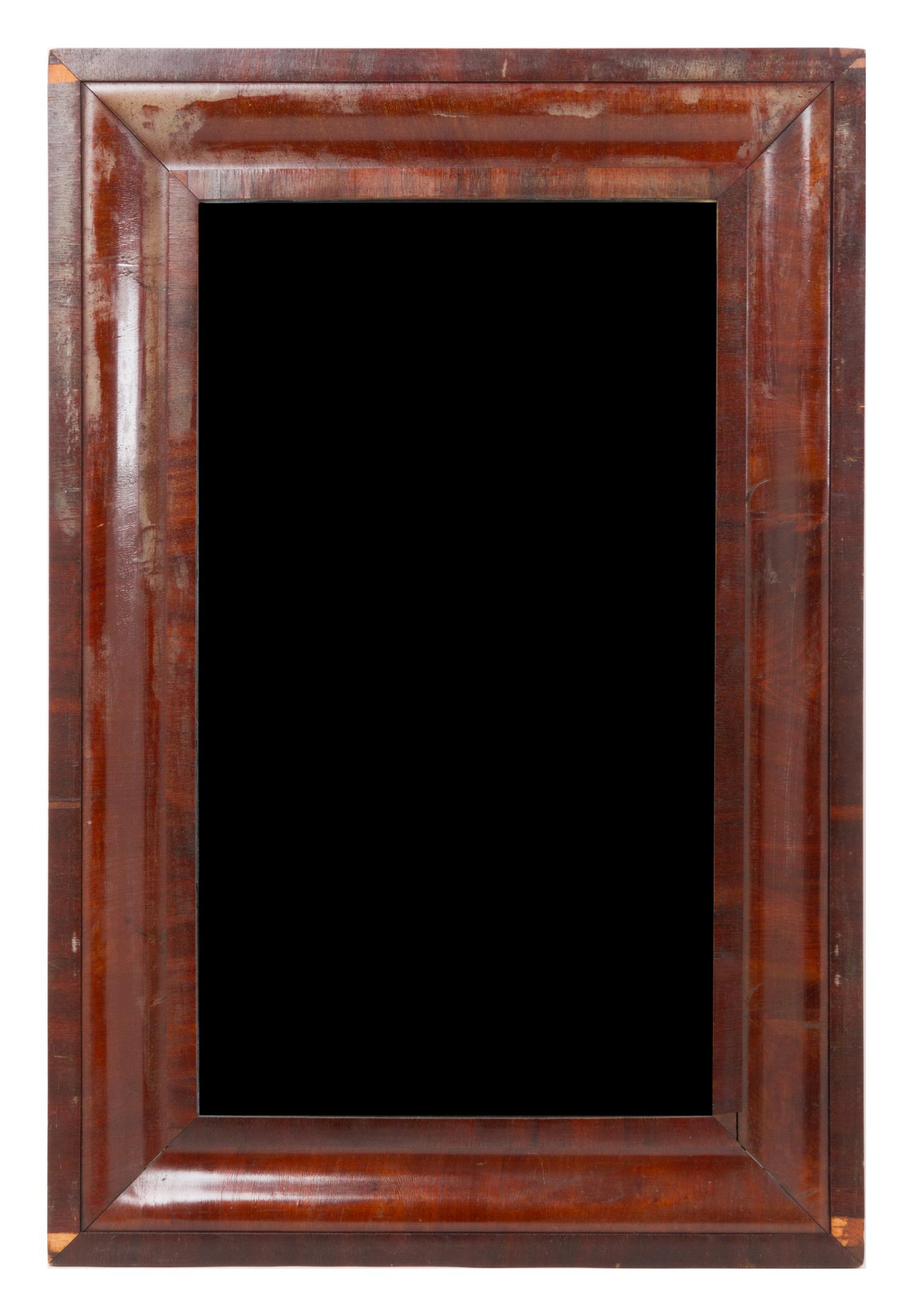 An American Mahogany Mirror Height 36 3/4 x width 24 1/2 inches.