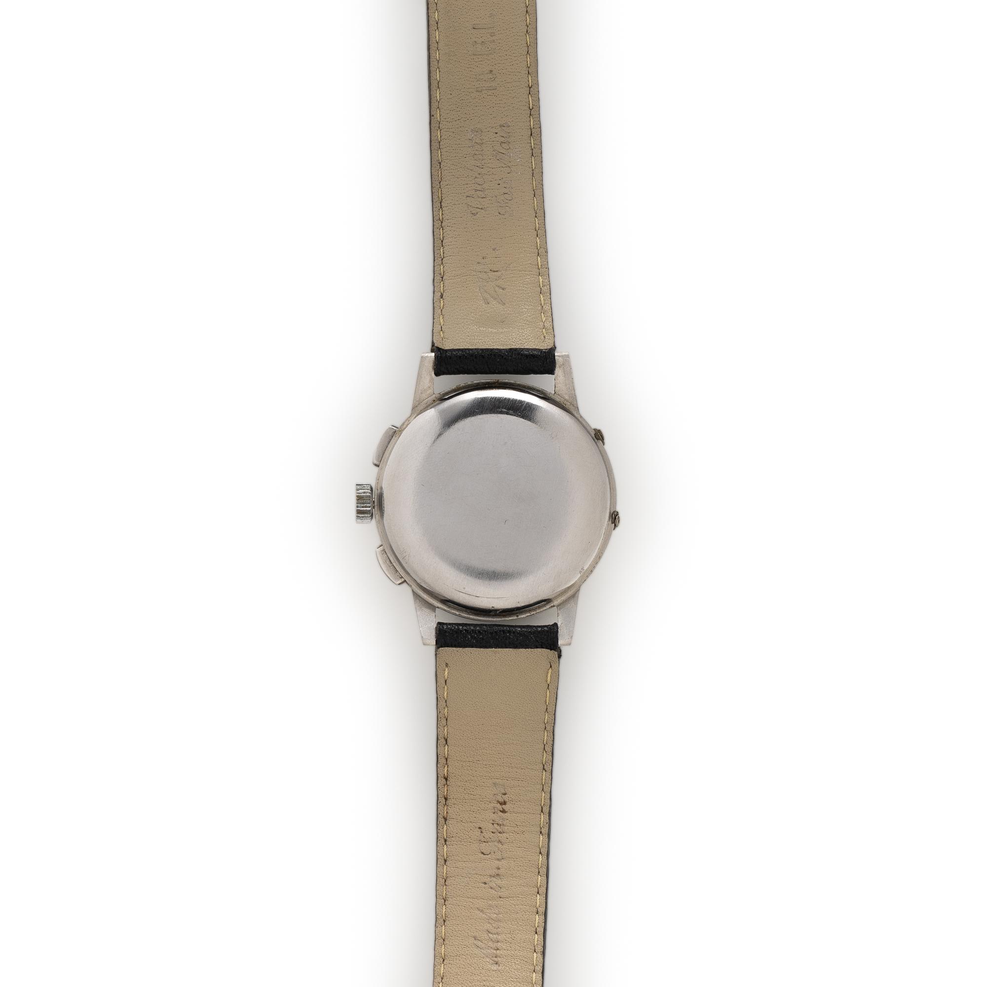 HEUER, REF. 2543 STAINLESS STEEL TRIPLE CALENDAR CHRONOGRAPH WATCH