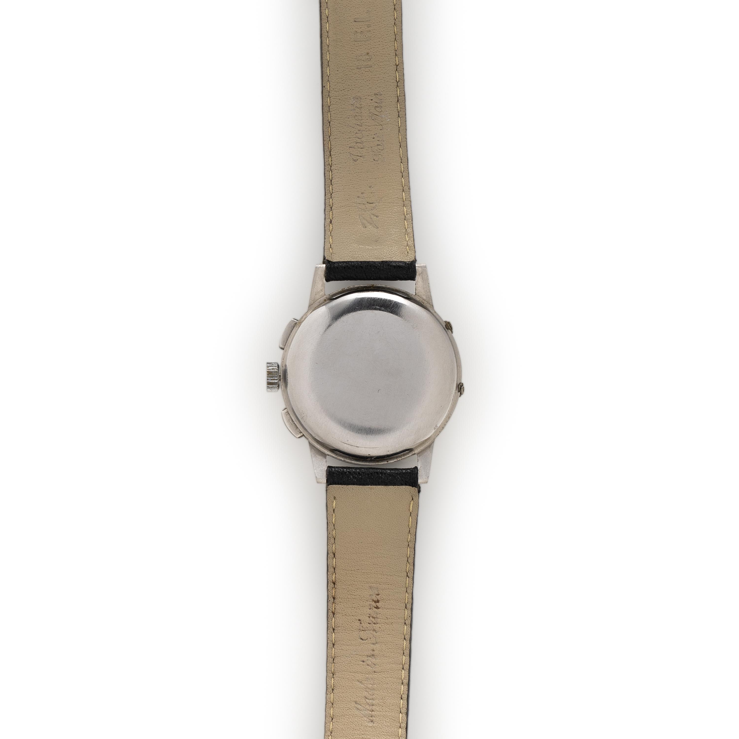 HEUER, REF. 2543 STAINLESS STEEL TRIPLE CALENDAR CHRONOGRAPH WATCH