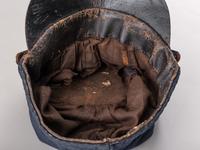 [CIVIL WAR]. McDowell-style forage cap with 4th regimental number and artillery insignia.