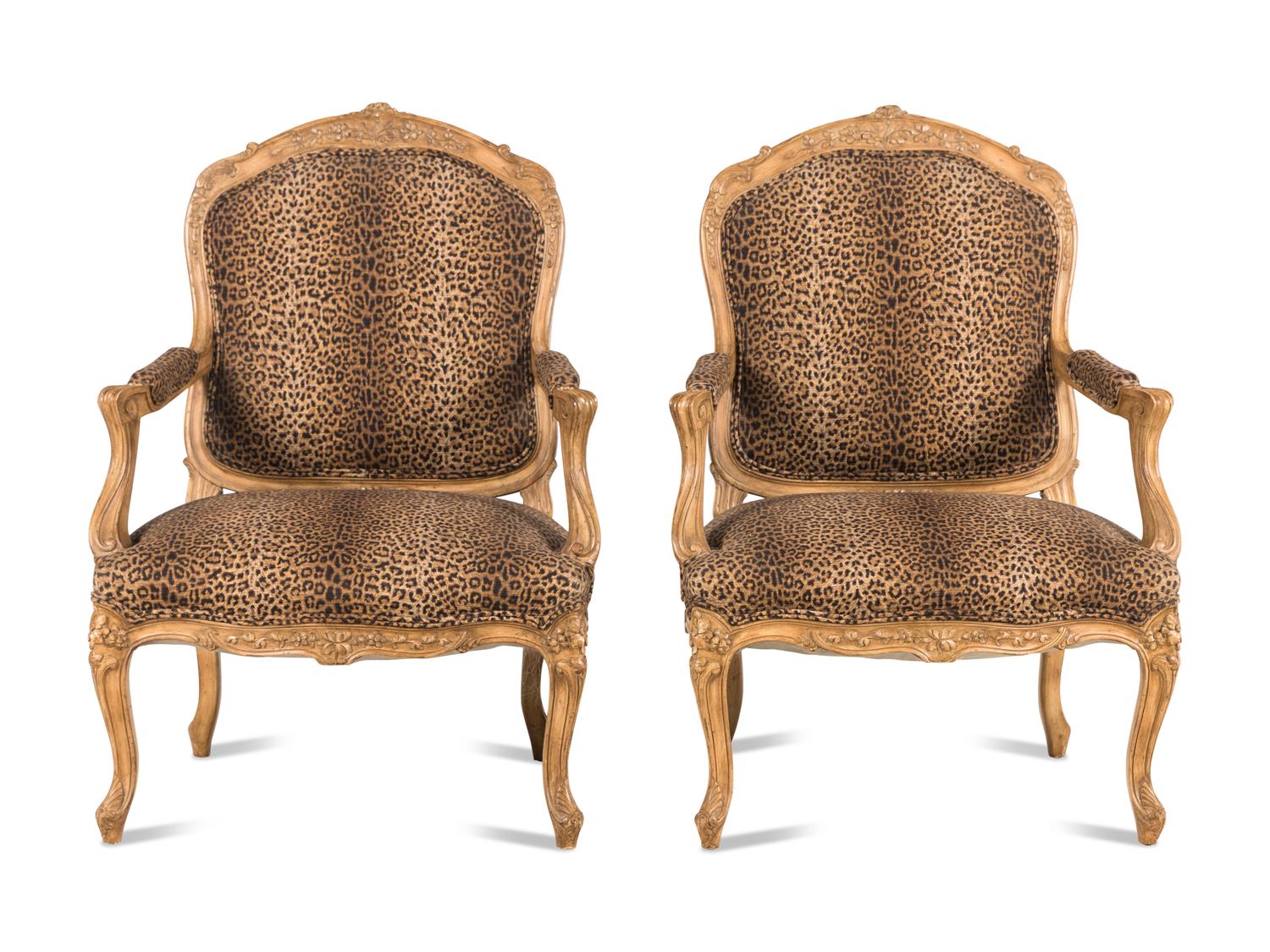 A Pair of Louis XV Style Carved Wood Fauteuils