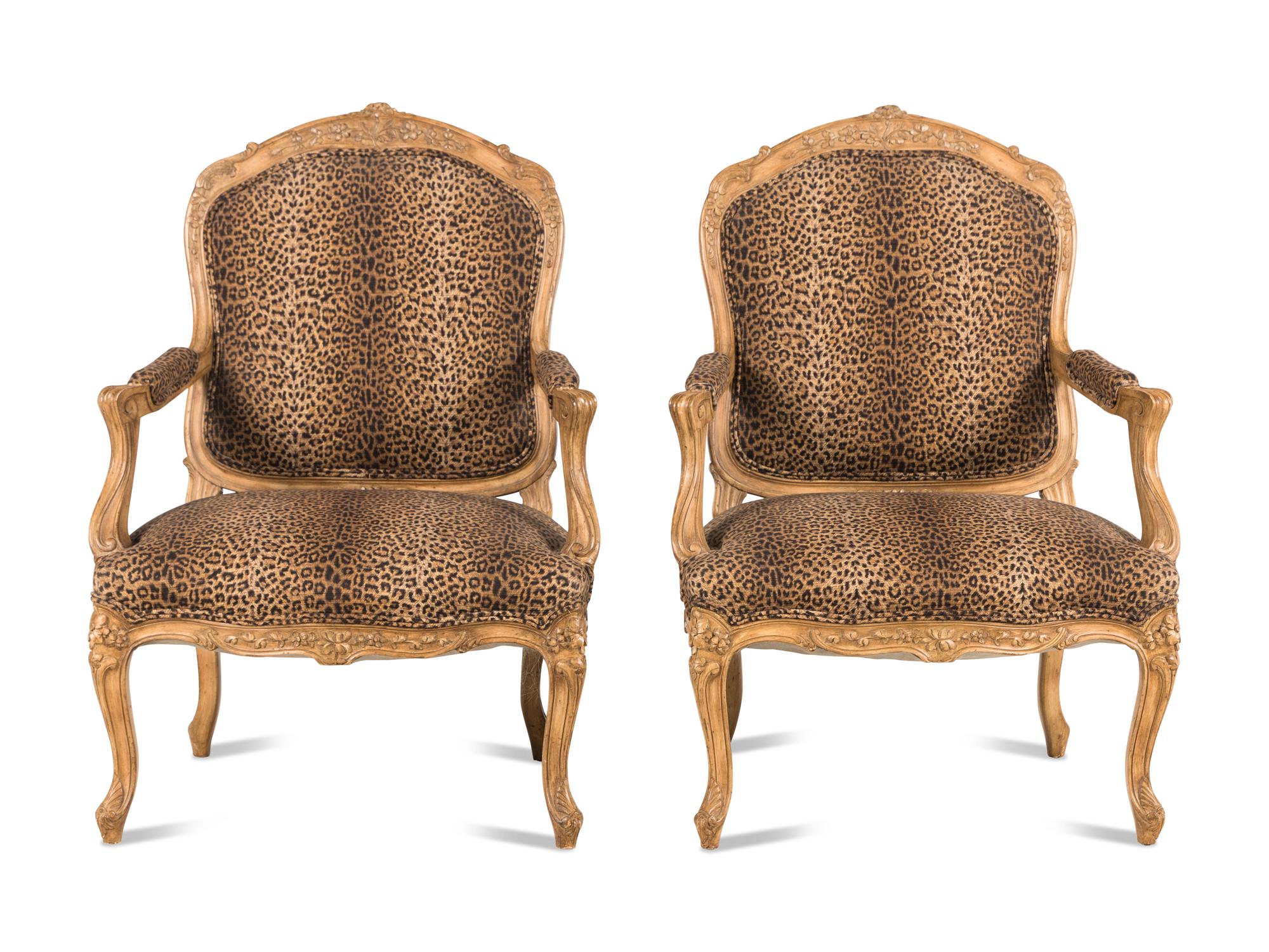 A Pair of Louis XV Style Carved Wood Fauteuils