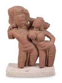 A Sandstone Figural Group