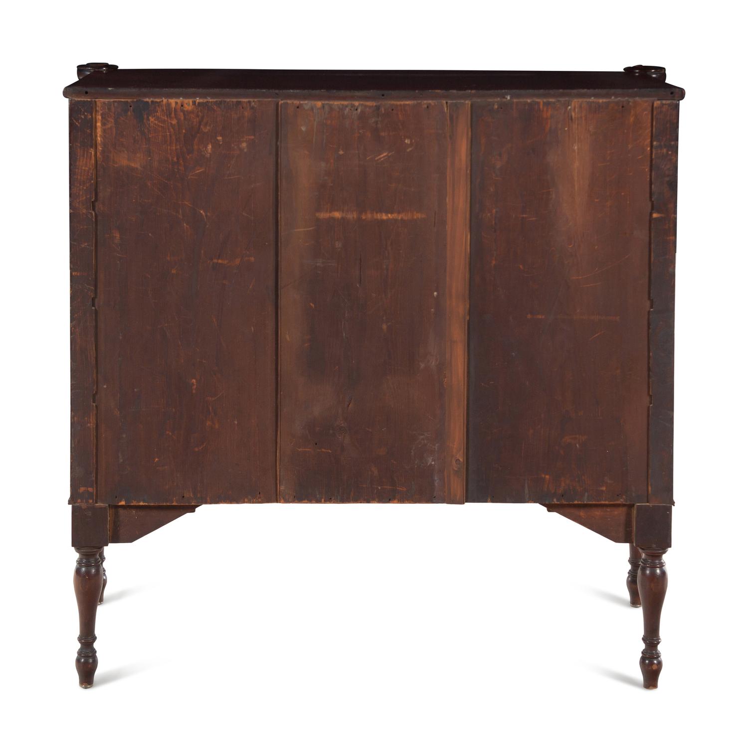 A Federal Spiral-Twist Carved Mahogany Bow Front Chest of Drawers