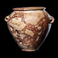 An Egyptian Breccia Jar
