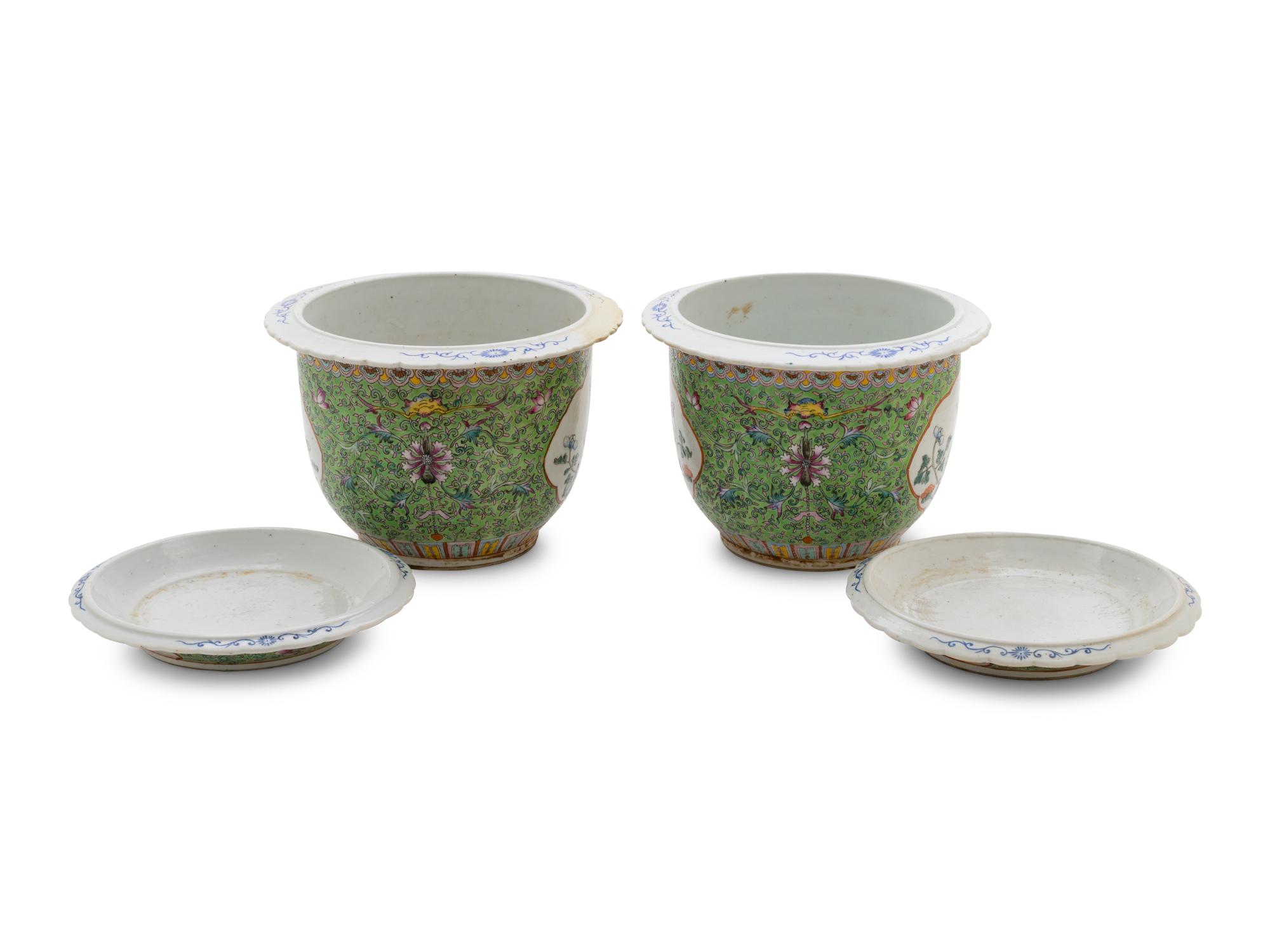 A Pair of Apple Green Ground Famille Rose Flower Pots and Stands