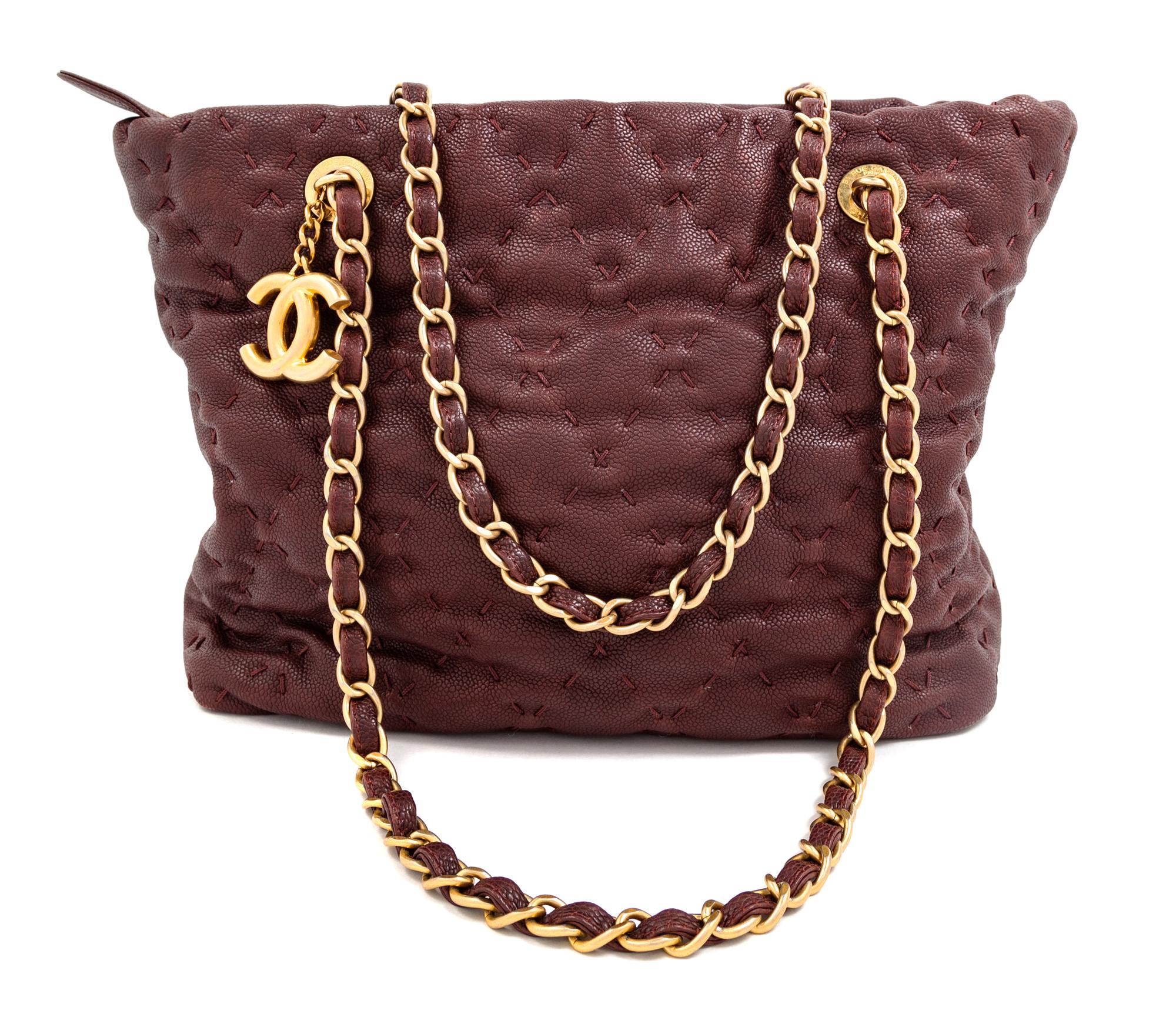 A Chanel Burgundy Caviar Quilted Wild Stitch Tote, 10.5" H x 12.5" W x 5" D; Strap drop: