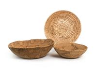 Seven Navajo/ Jicarilla Area Baskets Height of largest 4 x diameter 15 inches.