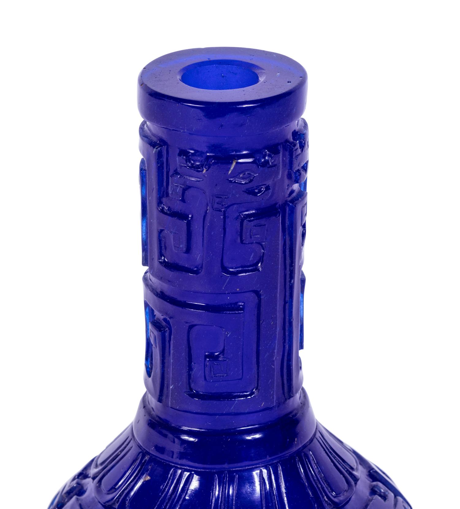 A Chinese Carved Transparent Sapphire Blue Glass Bottle Vase