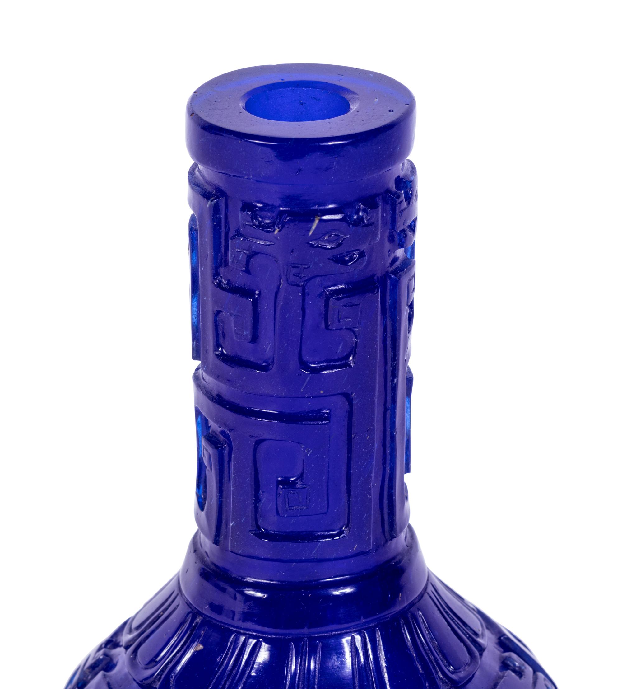 A Chinese Carved Transparent Sapphire Blue Glass Bottle Vase