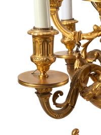 A Pair of Napoleon III Gilt Bronze and Rouge Griotte Marble Nine-Light Candelabra