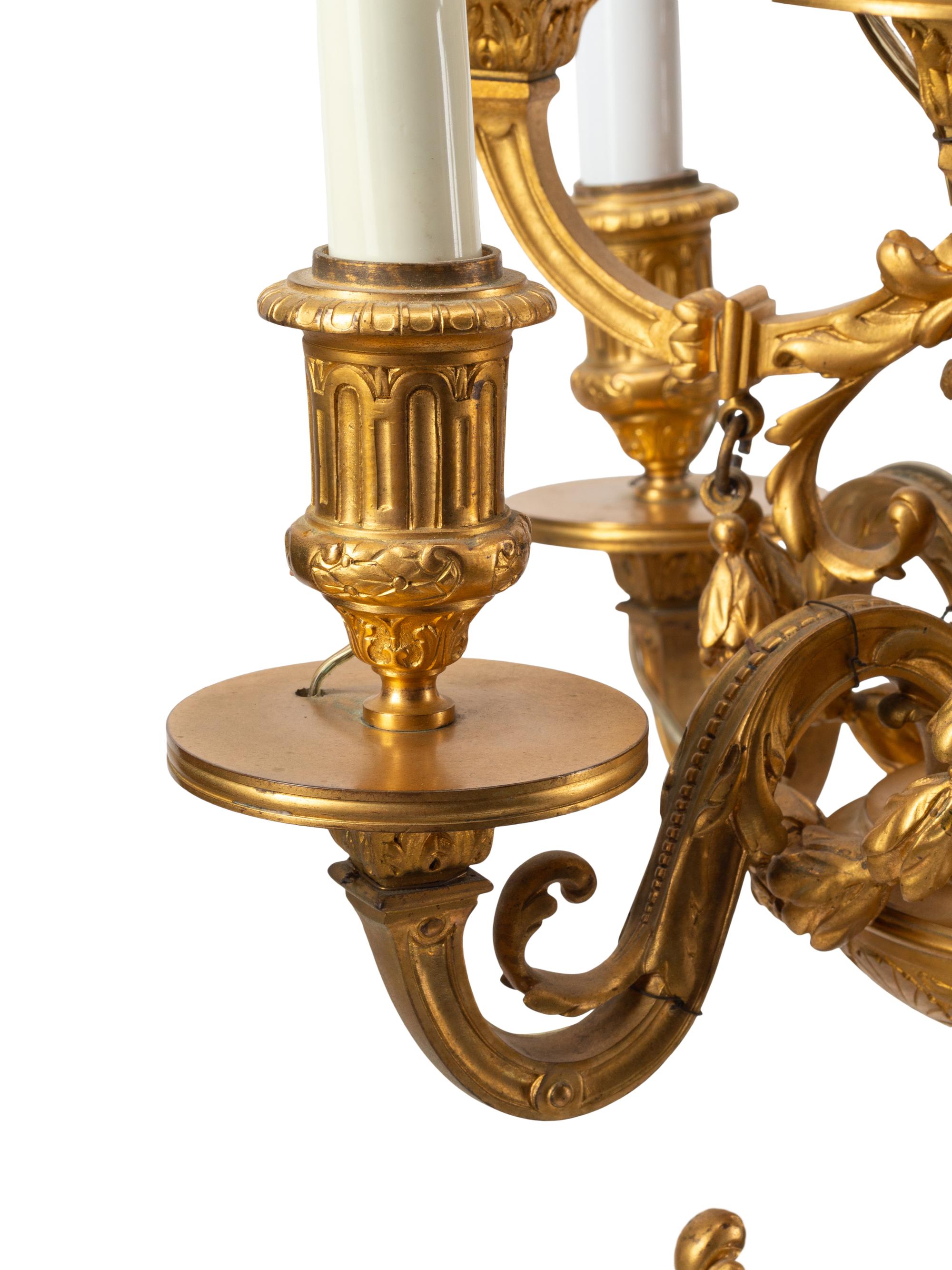 A Pair of Napoleon III Gilt Bronze and Rouge Griotte Marble Nine-Light Candelabra
