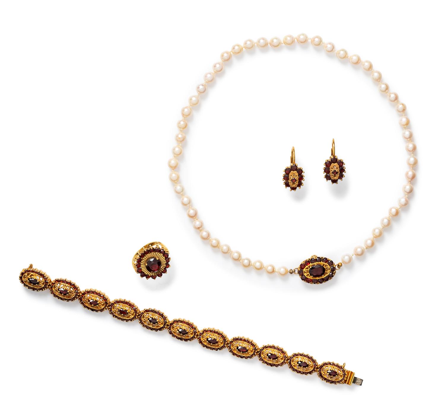 A Collection of Yellow Gold and Garnet Jewelry,