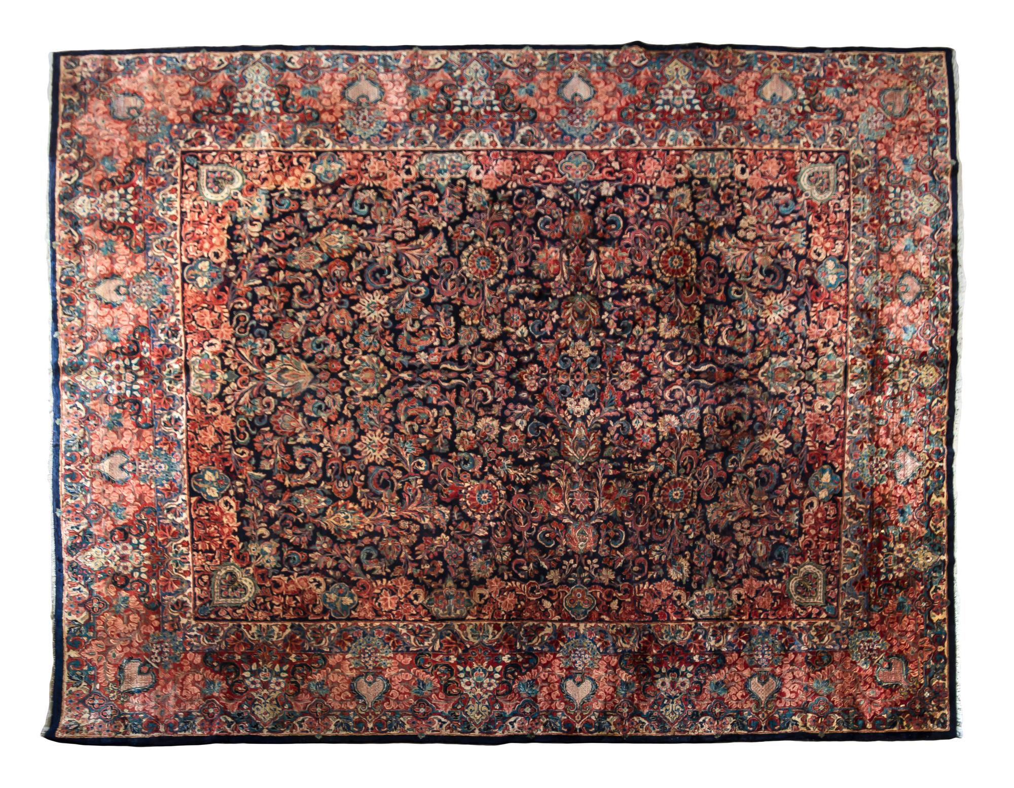 A Sarouk Wool Rug 14 feet x 12 feet.