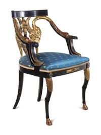 Two Empire Style Parcel Gilt Ebonized Armchairs