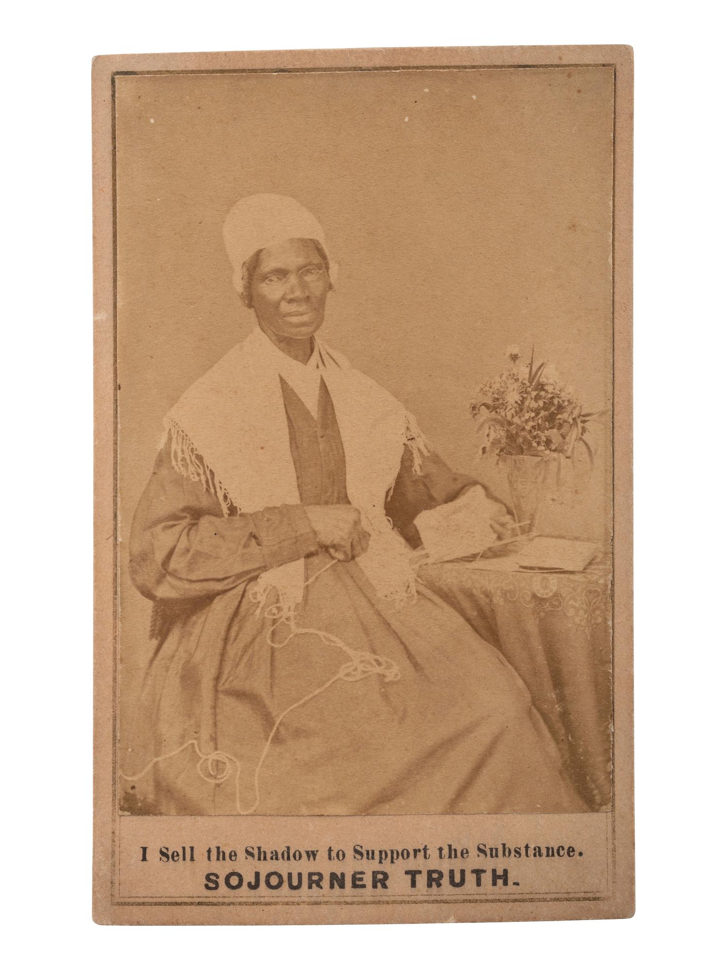 [TRUTH, Sojourner (1797-1883)]. CDV of Sojourner Truth with flowers. Michigan: 1864.
