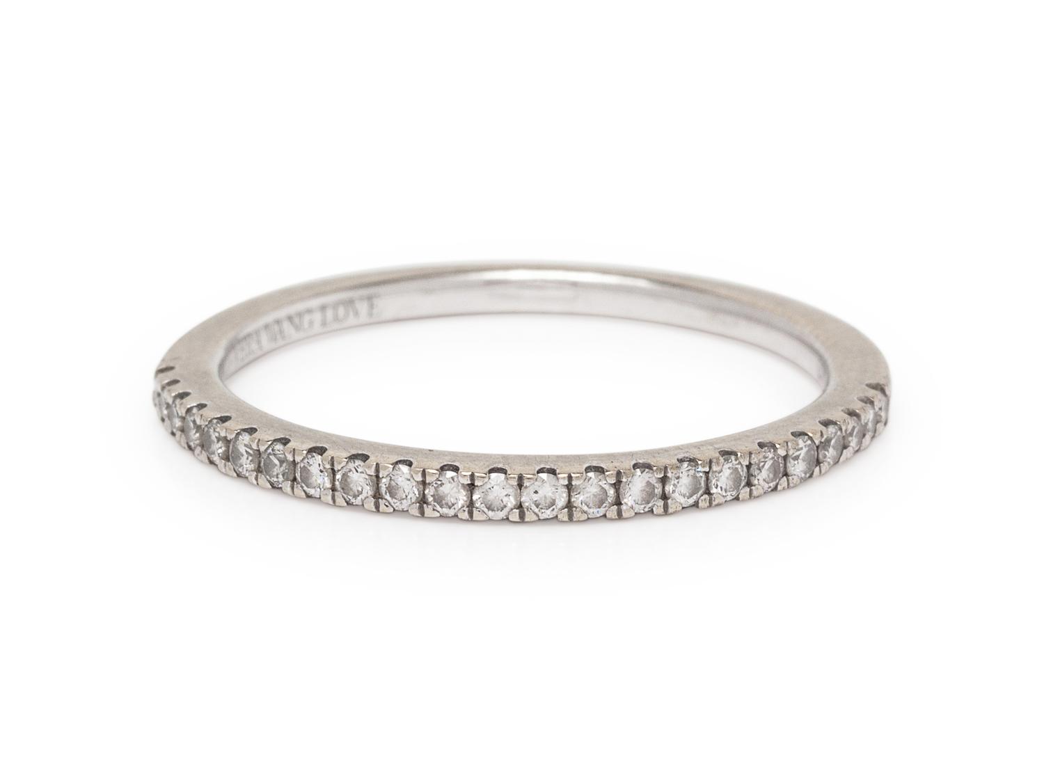 A 14 Karat White Gold and Diamond Ring,