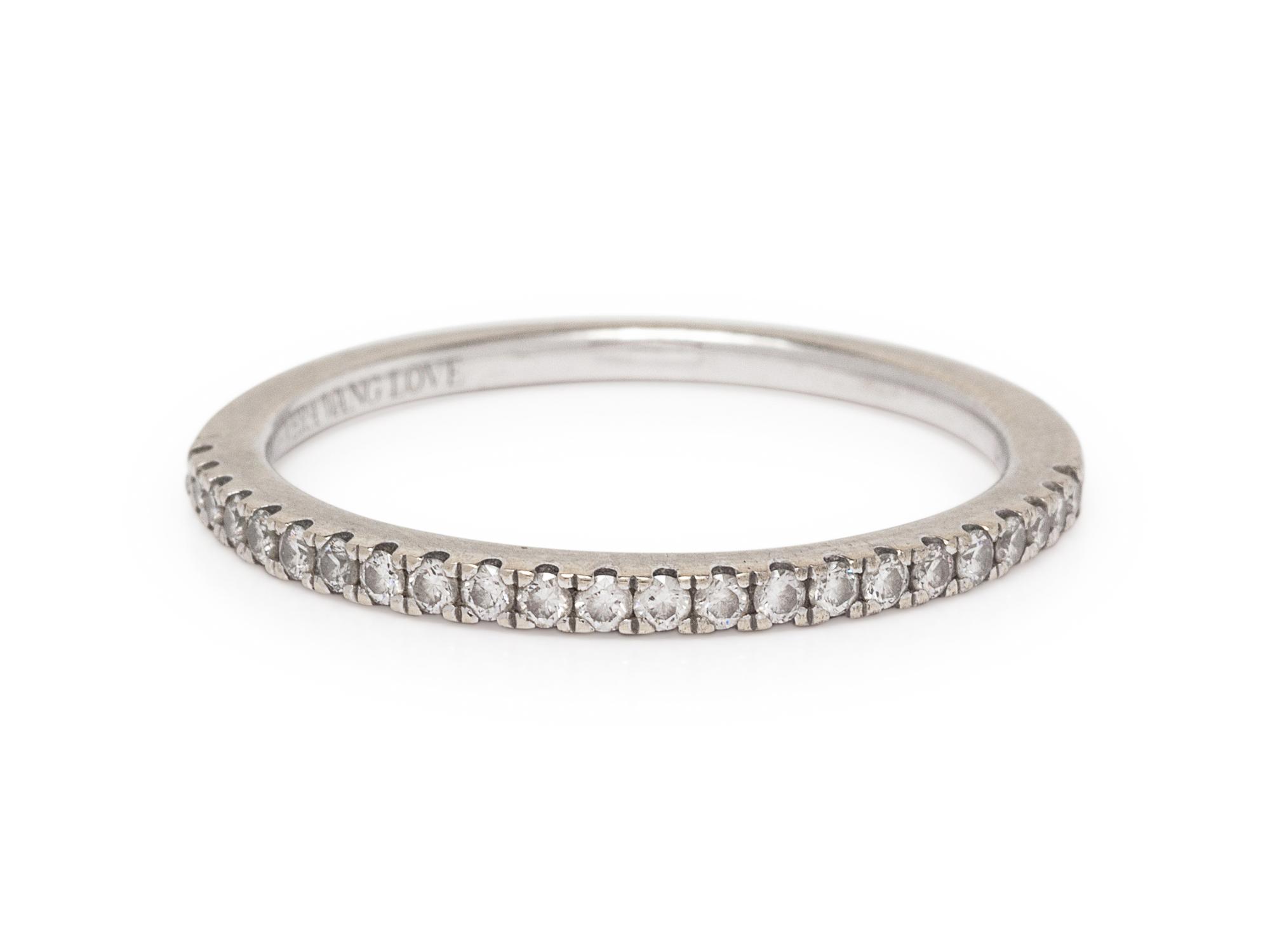 A 14 Karat White Gold and Diamond Ring,