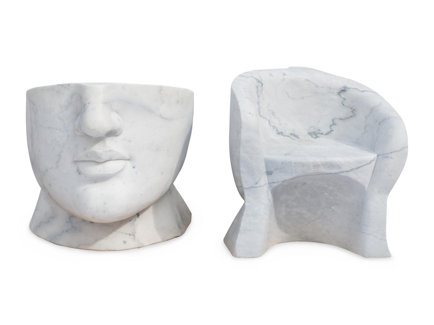 A Pair of Italian Carved White Marble “Face” Chairs