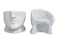 A Pair of Italian Carved White Marble “Face” Chairs