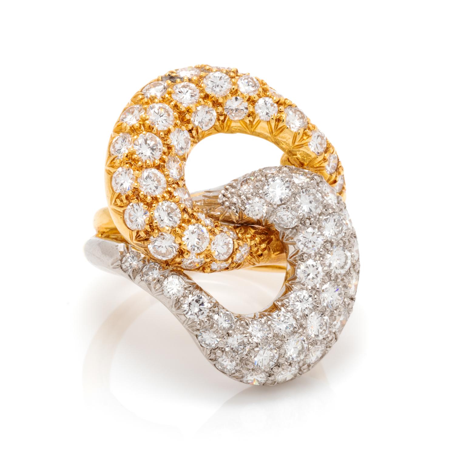 A Platinum, 18 Karat Yellow Gold and Diamond Ring, 9.00 dwts.