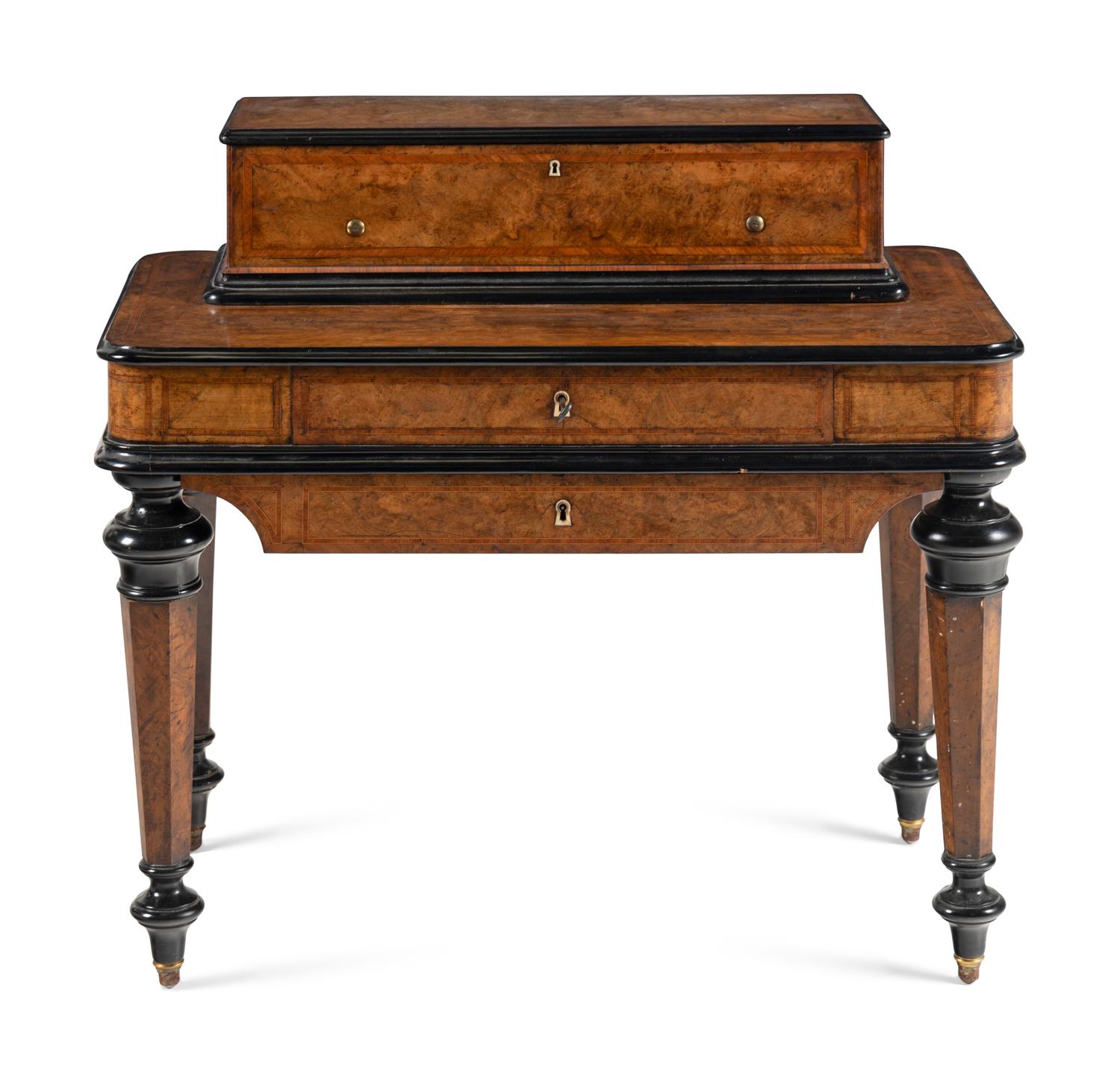 An Interchangeable Music Box on Table by Nicole Frères