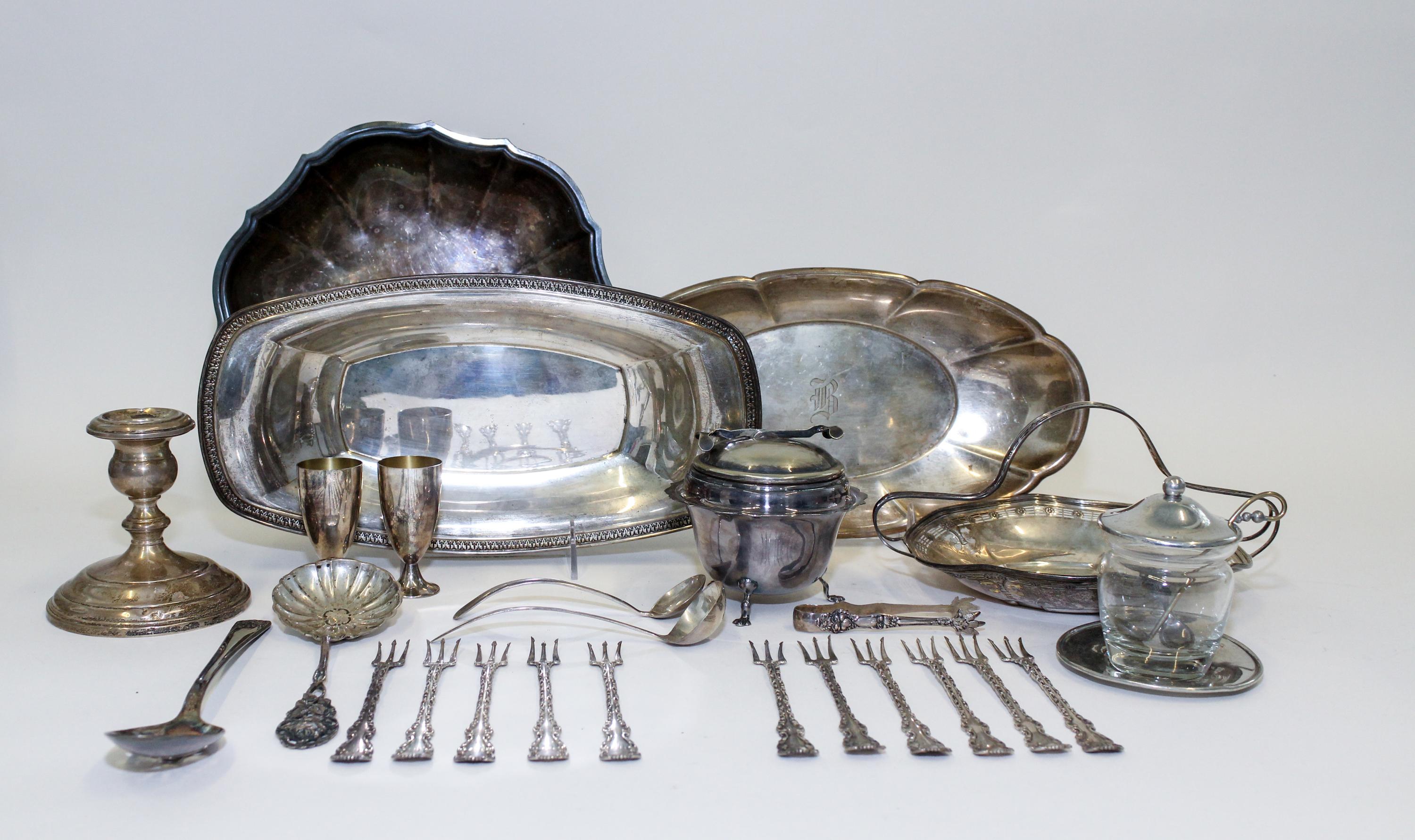 A Collection of American Silver Articles, Various Makers, comprising two Tiffany cups, a weighted Gorham candlestick, a handled basket,