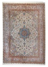 A Tabriz Wool Carpet 13 feet 4 inches x 9 feet 9 inches.