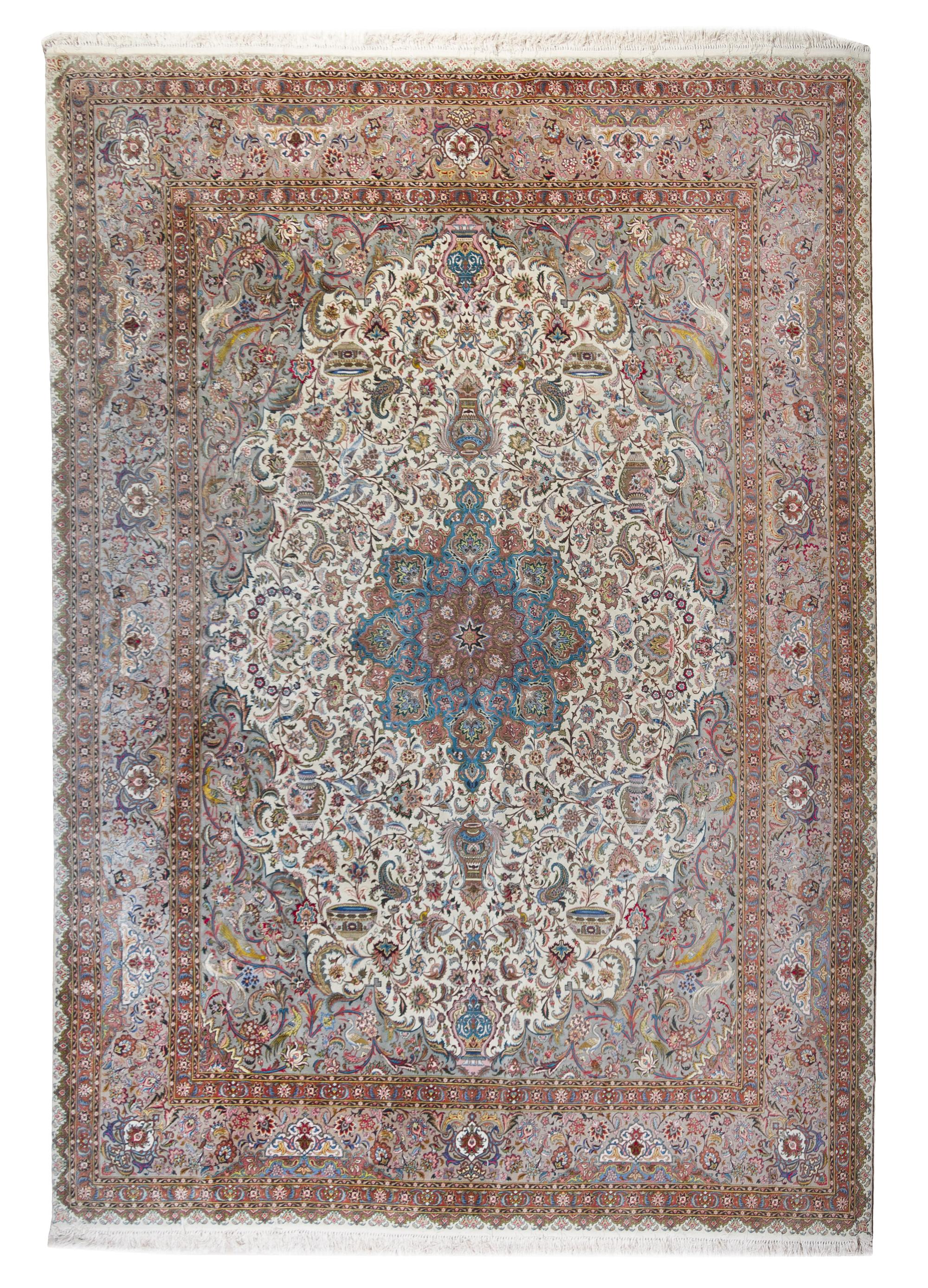 A Tabriz Wool Carpet 13 feet 4 inches x 9 feet 9 inches.