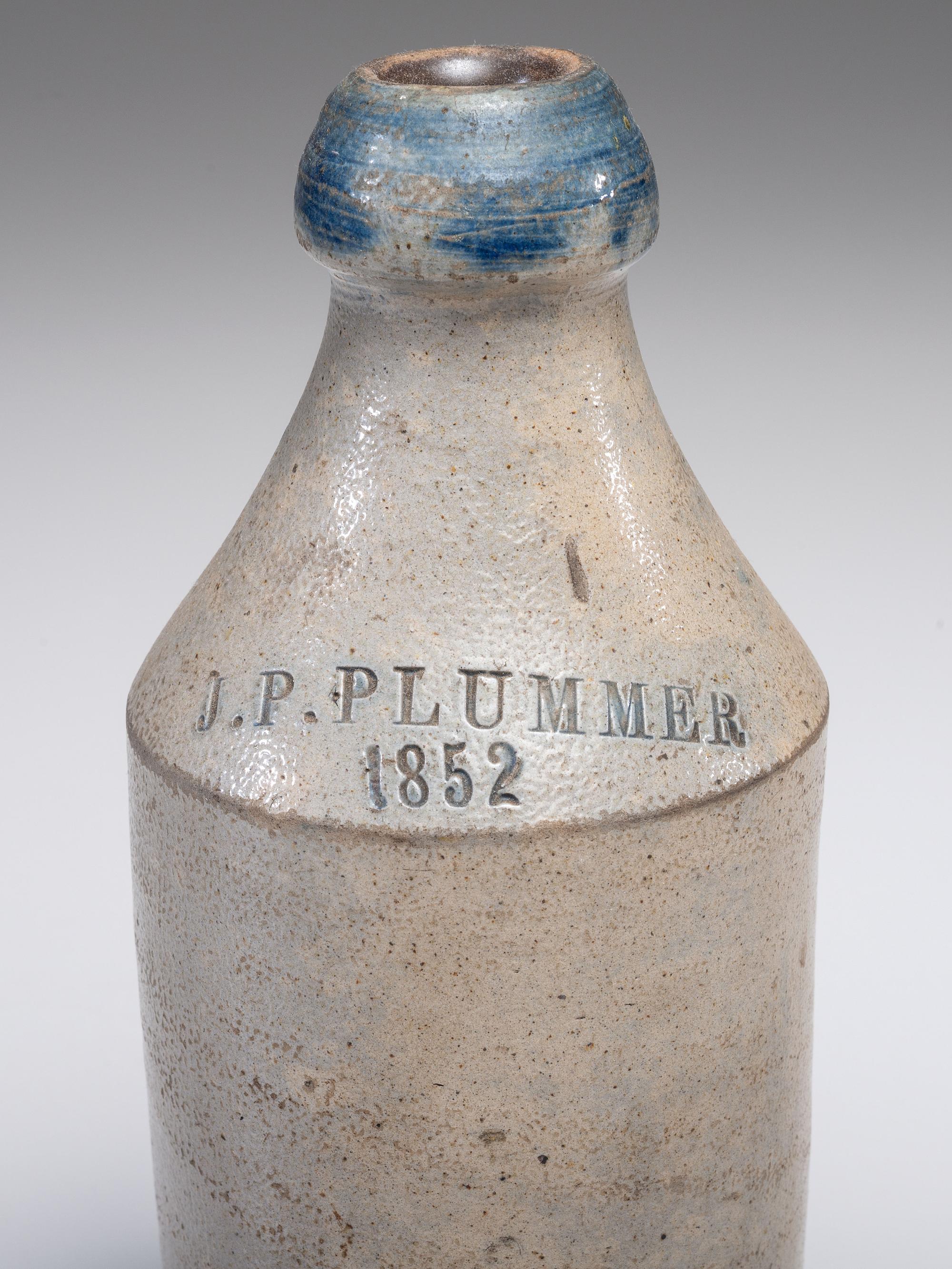 Five Stoneware Bottles and Canning Jars