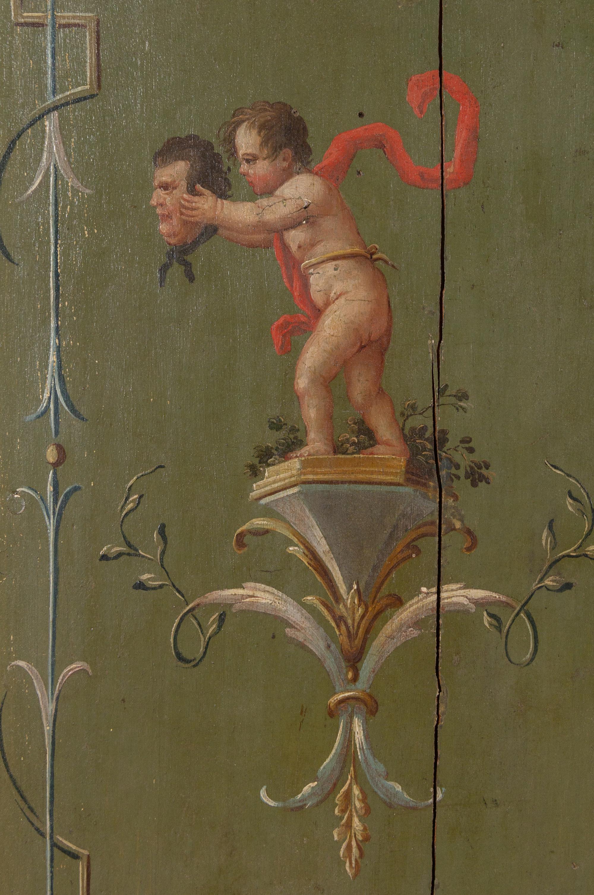 A Pair of Italian Painted and Parcel Gilt Doors