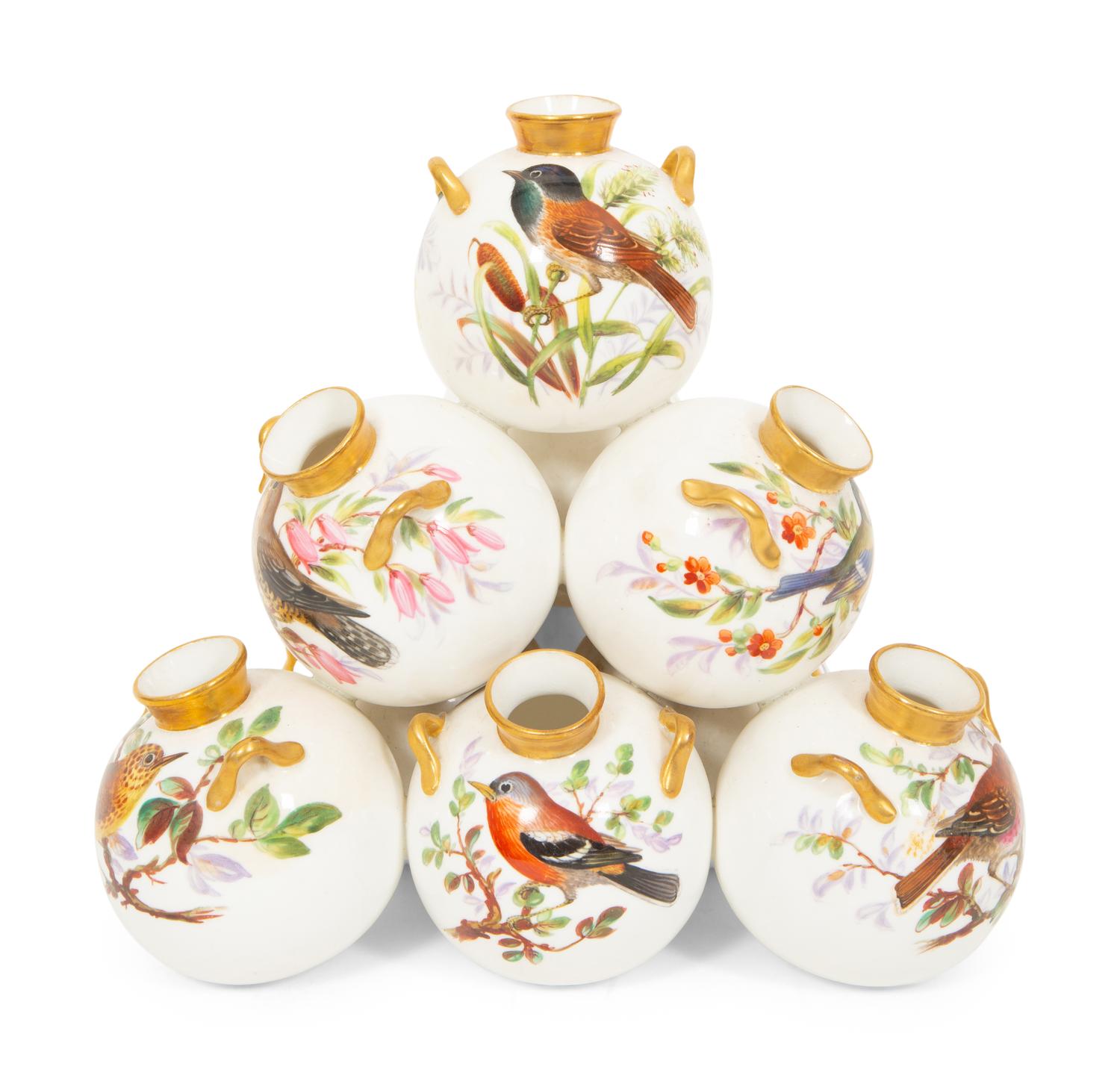 A Royal Worcester Porcelain Multi-stack of Ten Vases with Hand Painted Bird Decoration