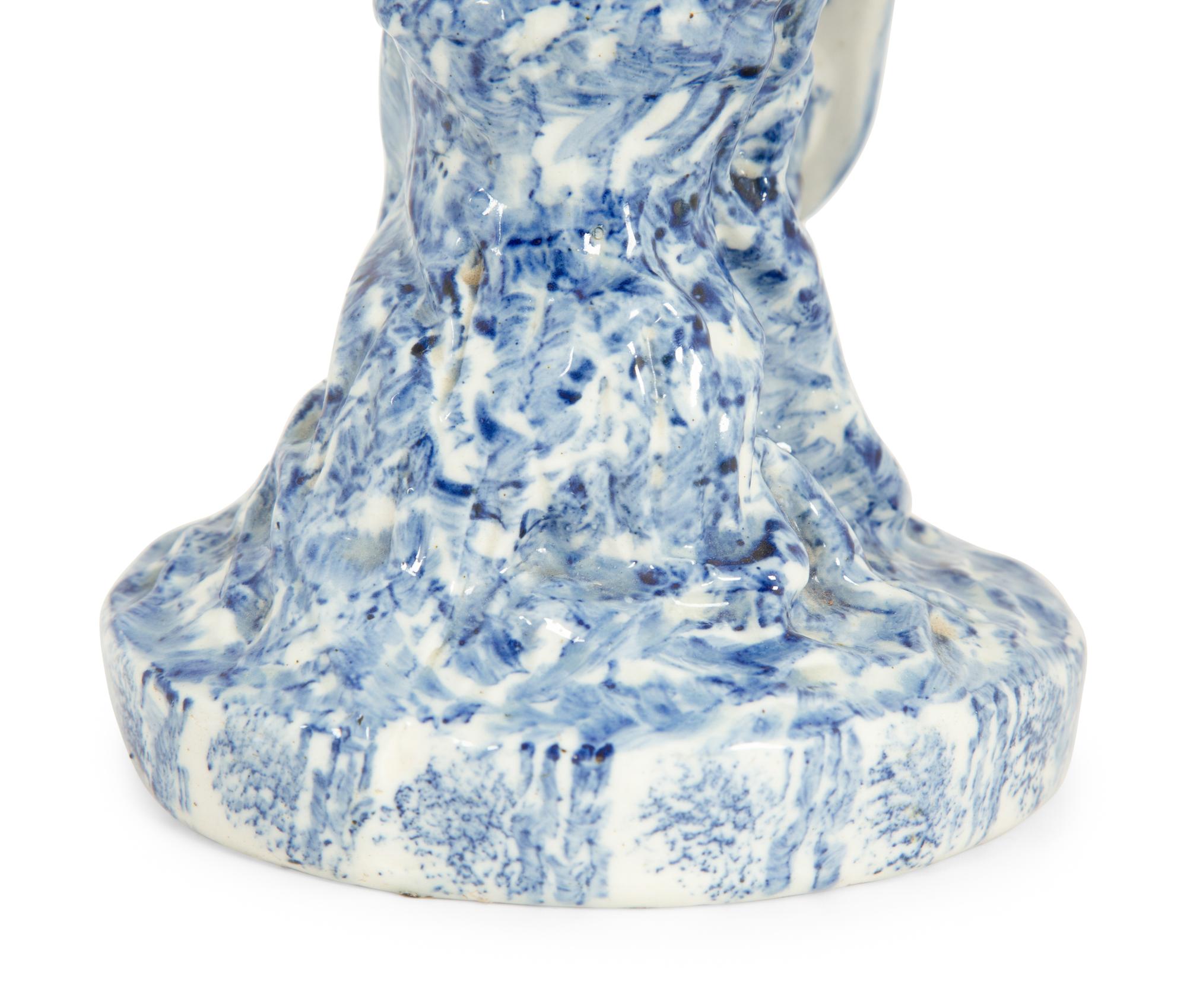 A Blue and White Spongeware Model of a Parrot