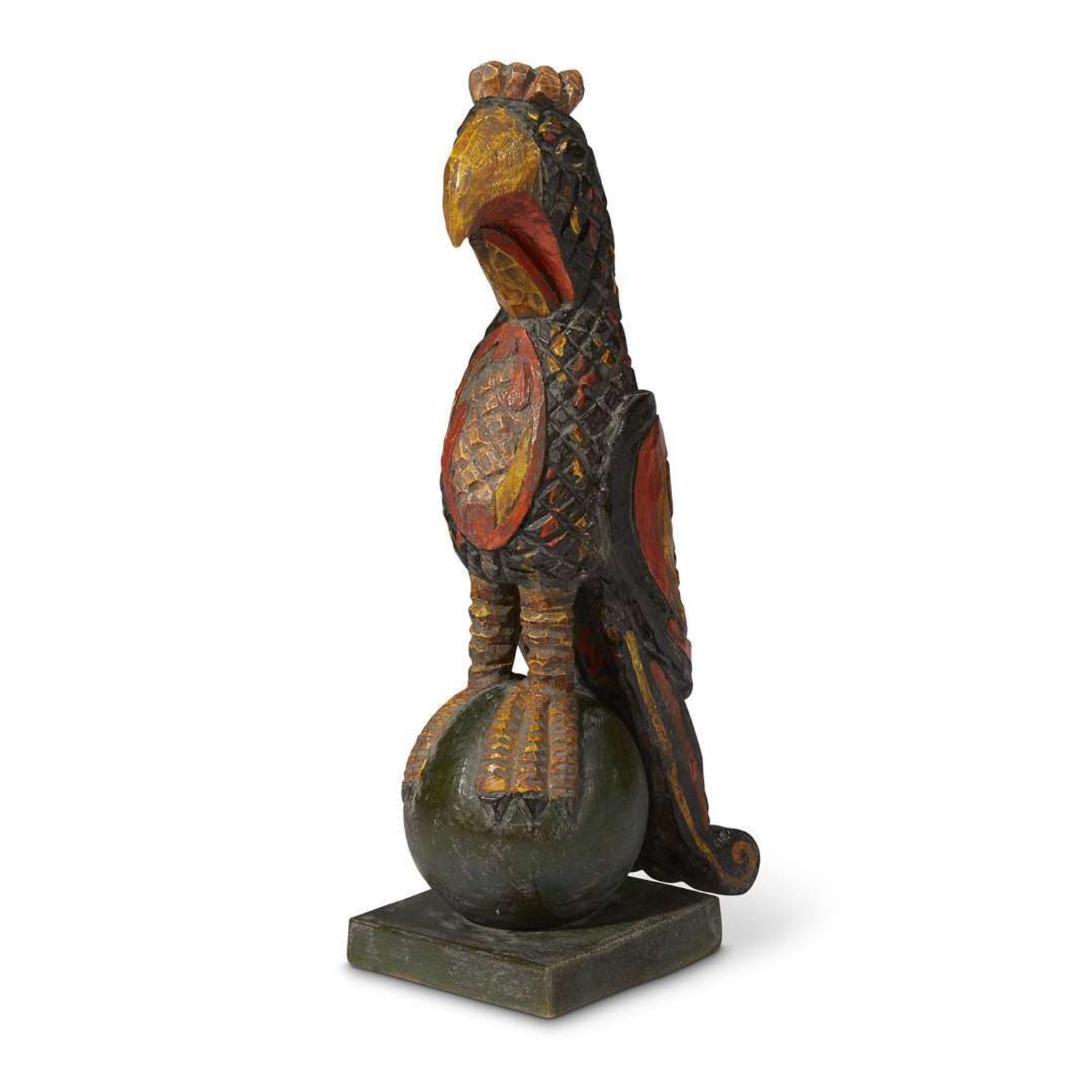 Carved and painted parrot perched on a sphere in the manner of Wilhelm Schimmel (1817-1890) Robert Stauffer, late 20th century